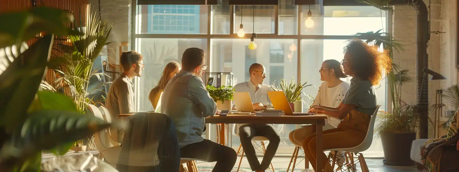 employees in a collaborative brainstorming session, sharing ideas and engaging in open communication to foster innovation and empowerment.